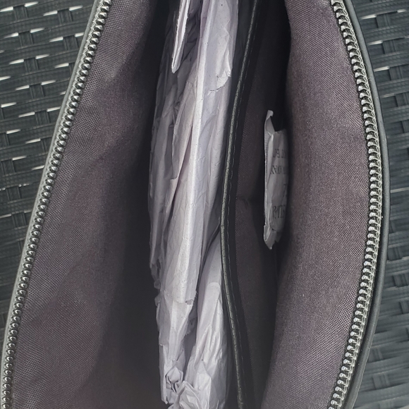 Calvin Klein Oversized Wristlet - Picture 4 of 4